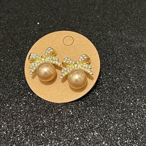 Women’s jewelry. Styled with faux pearl & bow embellished rhinestones earrings.